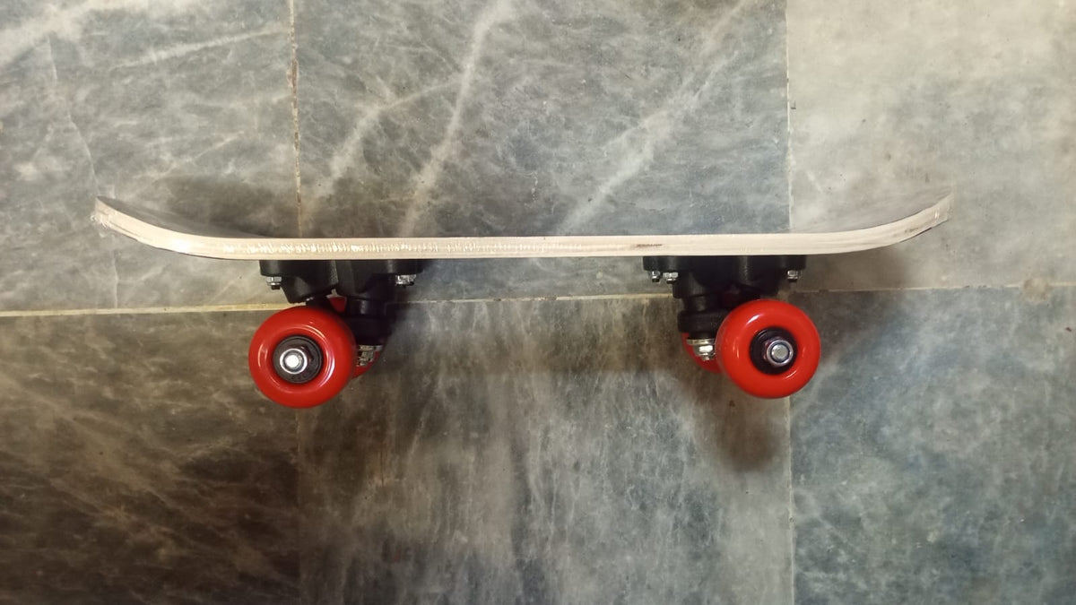 Small Kids Skateboard – Purple Graphic Design with Red Wheels