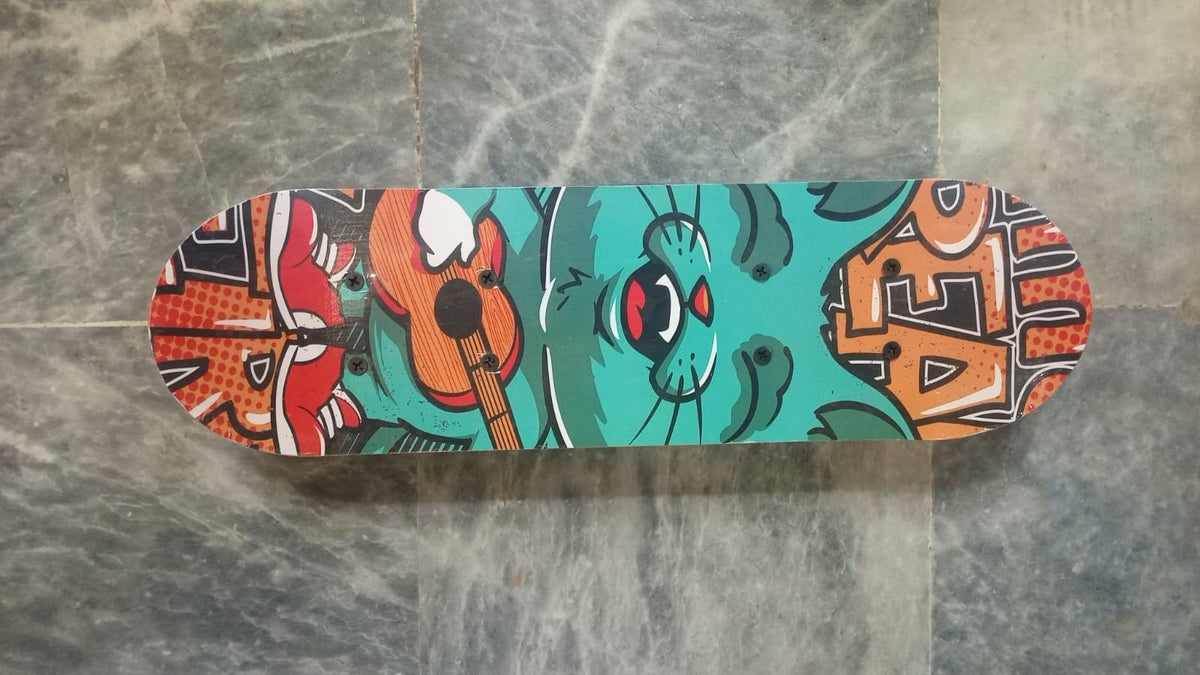 Small Size Kids Skateboard – Colorful Graphic Design with Blue Wheels