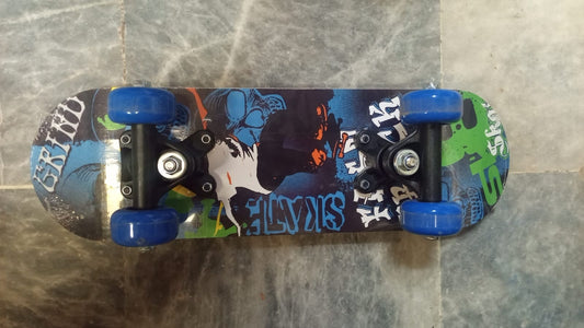 Small Kids Skateboard – Blue Graphic Design with Blue Wheels